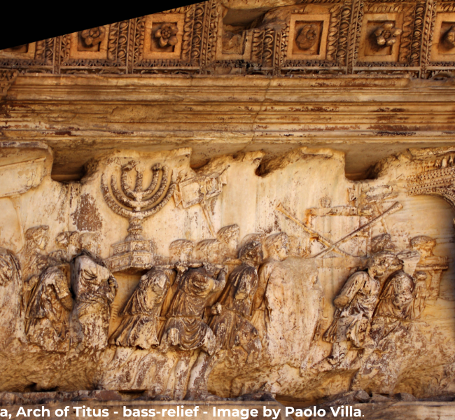 A photograph capturing the Arch of Titus in Rome, a monument built in 81 AD to commemorate the Roman victory in the Jewish-Roman War. On the bas-reliefs of the arch, one can observe the depiction of a menorah, taken as war spoils from the Temple in Jerusalem. The image symbolizes the conquest and destruction of the Second Temple, as well as the spiritual resilience of the Jewish people.